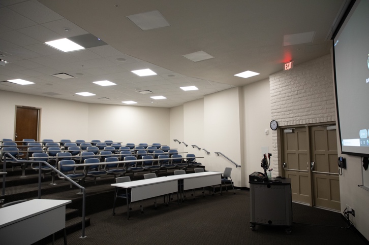 An empty room with tables and chairs
Description automatically generated with low confidence