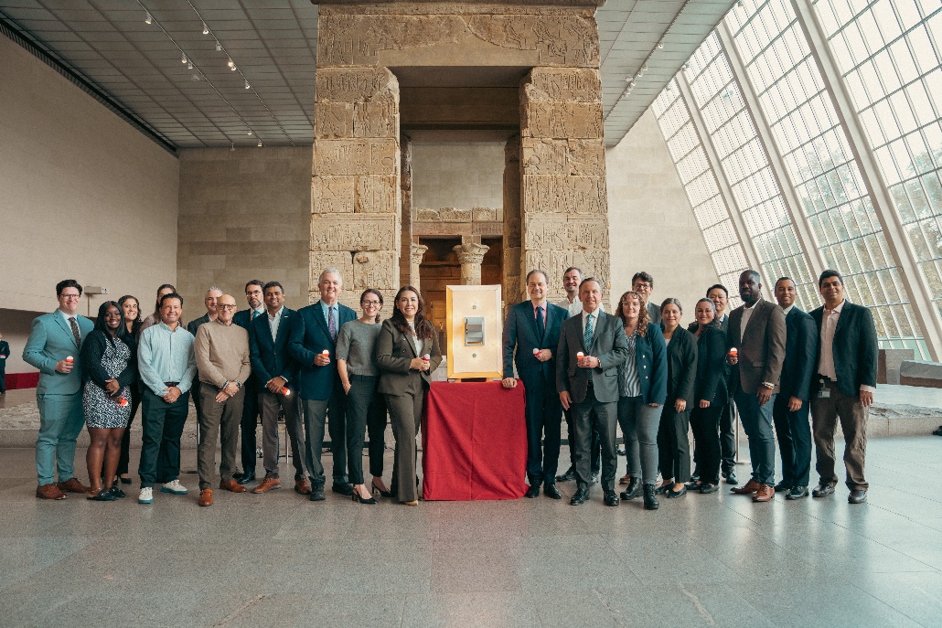 A group of people standing togetherAI-generated content may be incorrect.