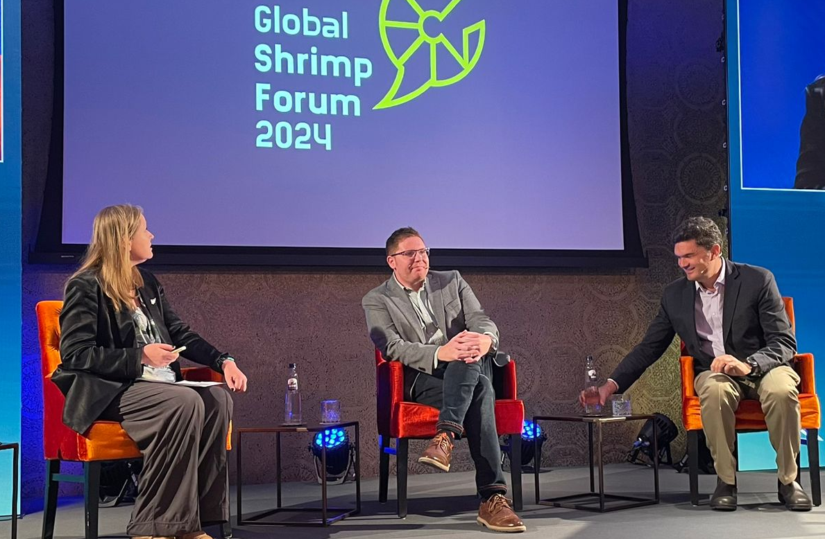 A group of people sitting in chairsDescription automatically generated