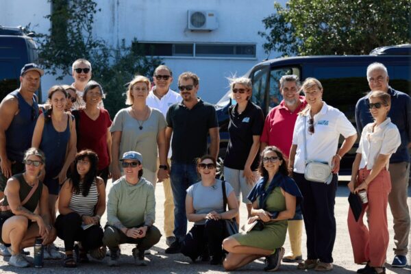 A group of people posing for a photoDescription automatically generated
