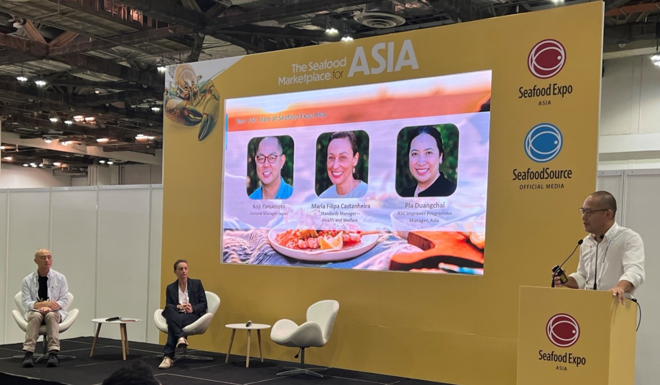 A group of people on stageDescription automatically generated