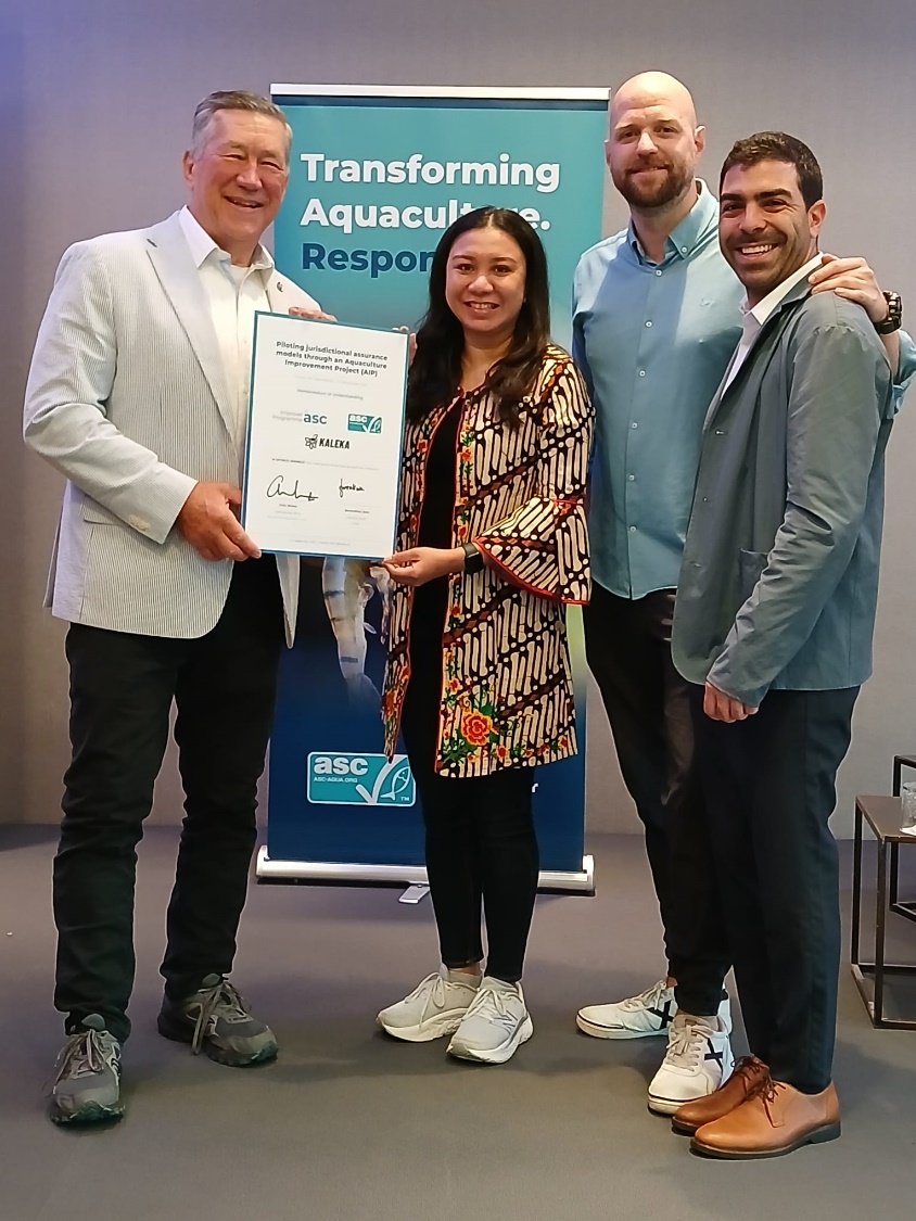 A group of people posing for a photoDescription automatically generated