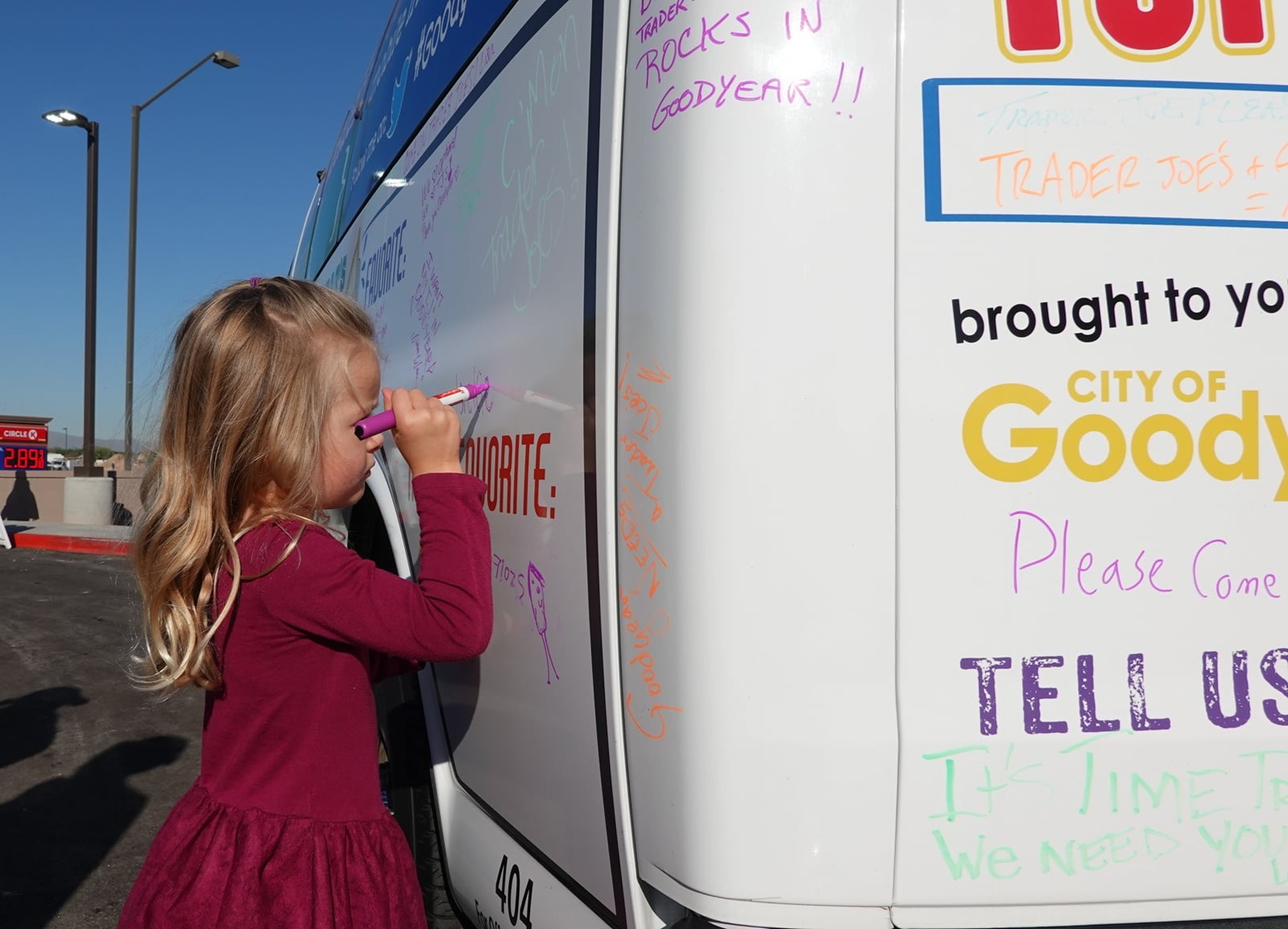 A picture containing text, person, outdoor, posingAI-generated content may be incorrect.