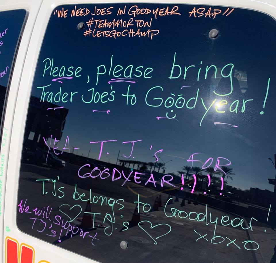 A window with writing on itAI-generated content may be incorrect.