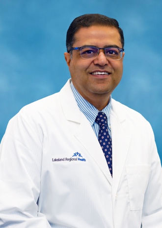 A person in a white coatAI-generated content may be incorrect.