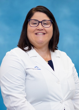 A person in a white coatAI-generated content may be incorrect.