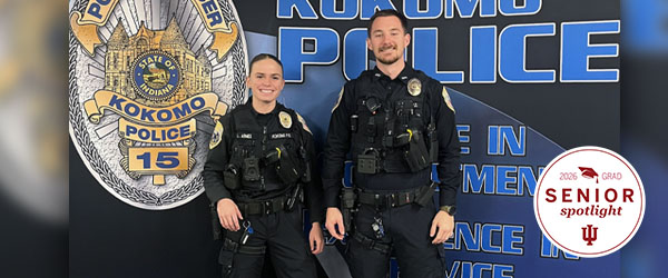 a woman and a man in police uniforms