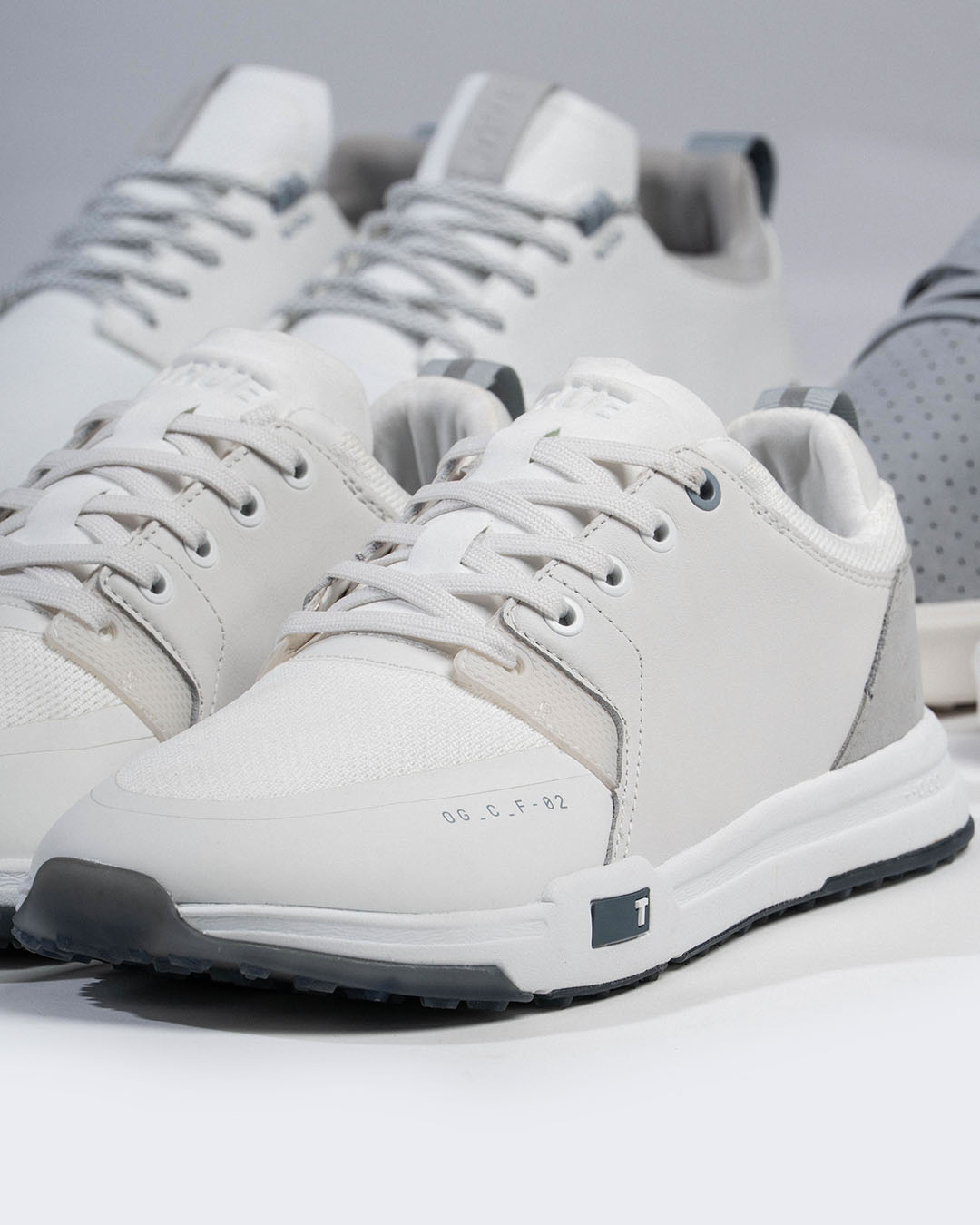 A group of white shoesAI-generated content may be incorrect.