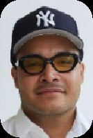 A person wearing a hat and glassesDescription automatically generated